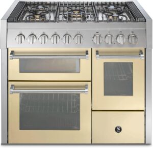 A stainless steel and gold gas range oven